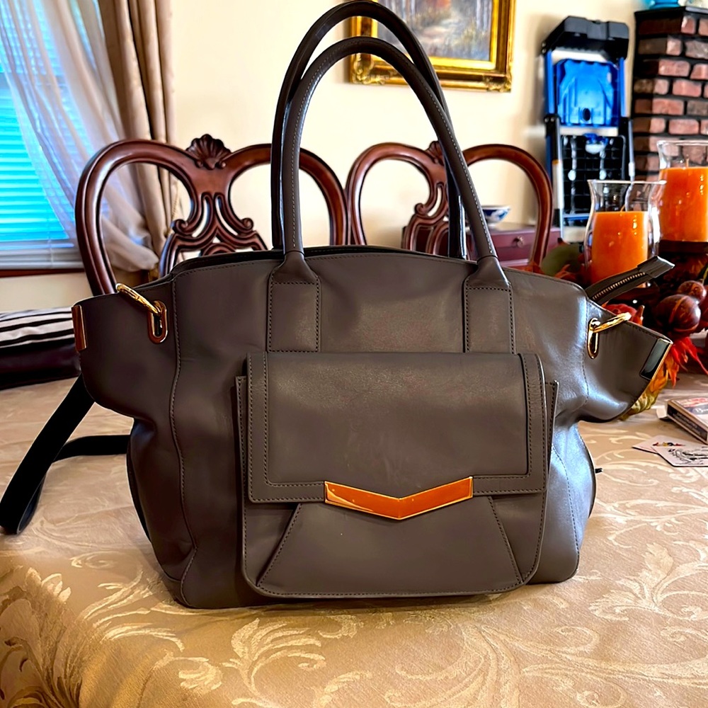 TIME ARROW LEATHER BAG